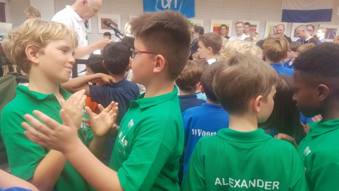 Wachtend op de prijsuitreiking